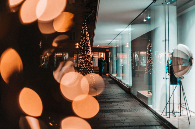 Celebrate the Holidays in Style with a White Christmas Tree and Sweet Treats